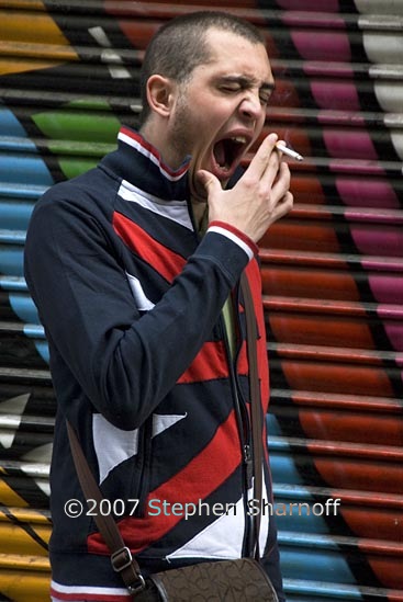 young man yawning graphic